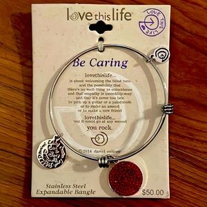 Love this life “Be caring” gorgeous silver tone charm bangle bracelet.